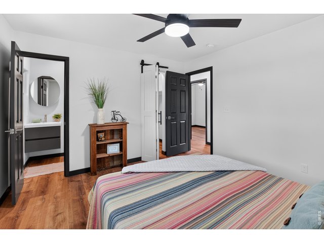 Property Photo 12 Primary bedroom with half bath and walk-in closet