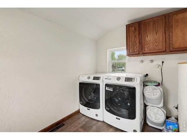 Property Photo 18 Large laundry area on the main floor next to the kitchen. Would make a nice mudroom  area as well.