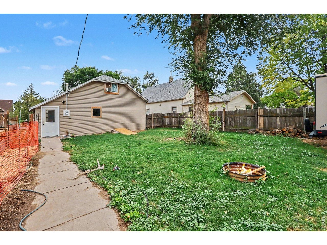 Property Photo 21 Walkway to home from Garage enters into the kitchen with laundry/mudroom for your convenience