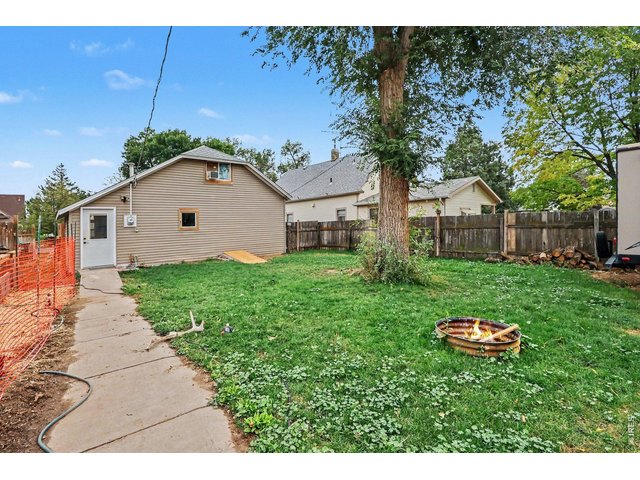 Property Photo 21 Walkway to home from Garage enters into the kitchen with laundry/mudroom for your convenience