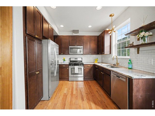 Property Photo 10 Kitchen w/ Granite Countertops