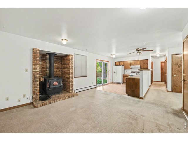 Property Photo 7 Open kitchen makes it easy between the patio door, dining/entertainment space and hallway.