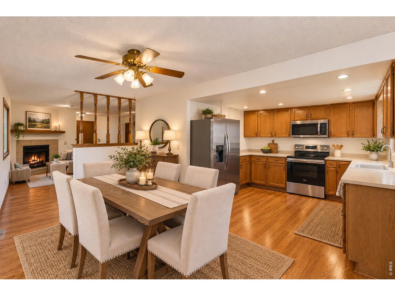 Property Photo 12 Open dining room, kitchen and living room. Virtually Staged.