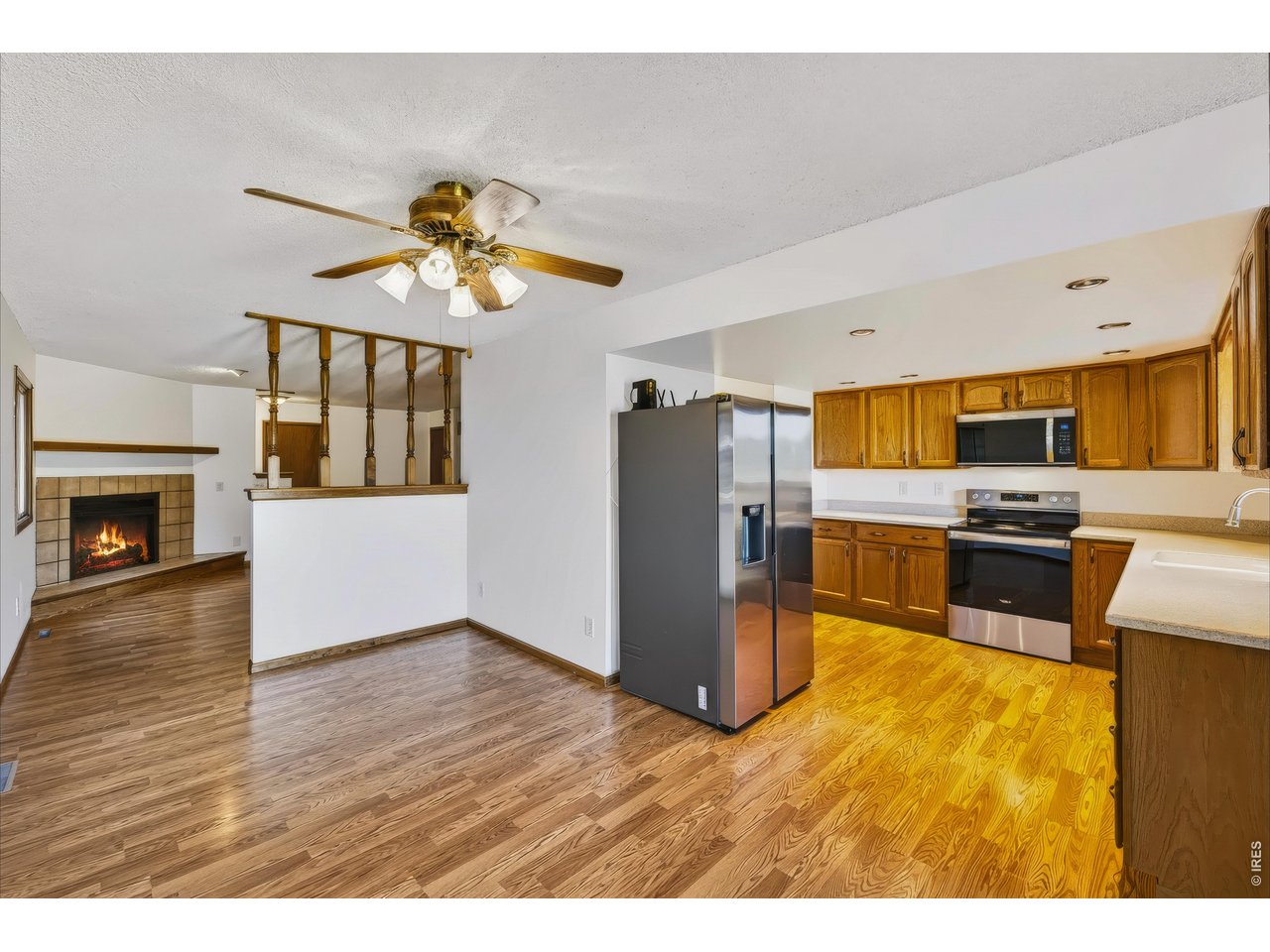 Property Photo 13 Open dining room, kitchen and living room.