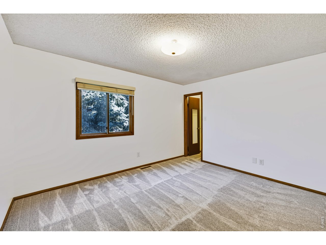 Property Photo 31 Bedroom 2 with walk-in closet.