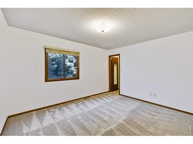 Property Photo 31 Bedroom 2 with walk-in closet.
