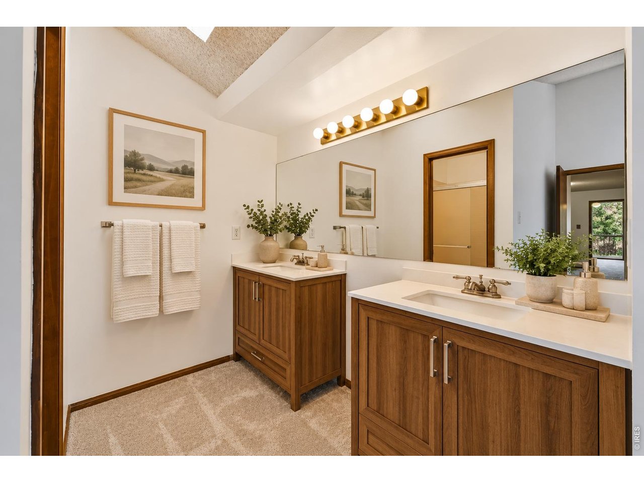 Property Photo 20 Primary Suite Dual Vanity Area. Virtually Staged.