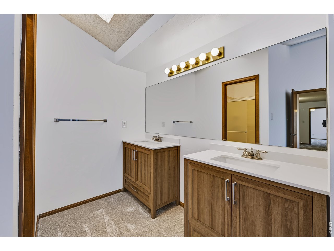 Property Photo 21 Primary Suite Dual Vanity Area.