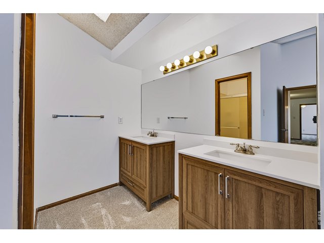 Property Photo 21 Primary Suite Dual Vanity Area.