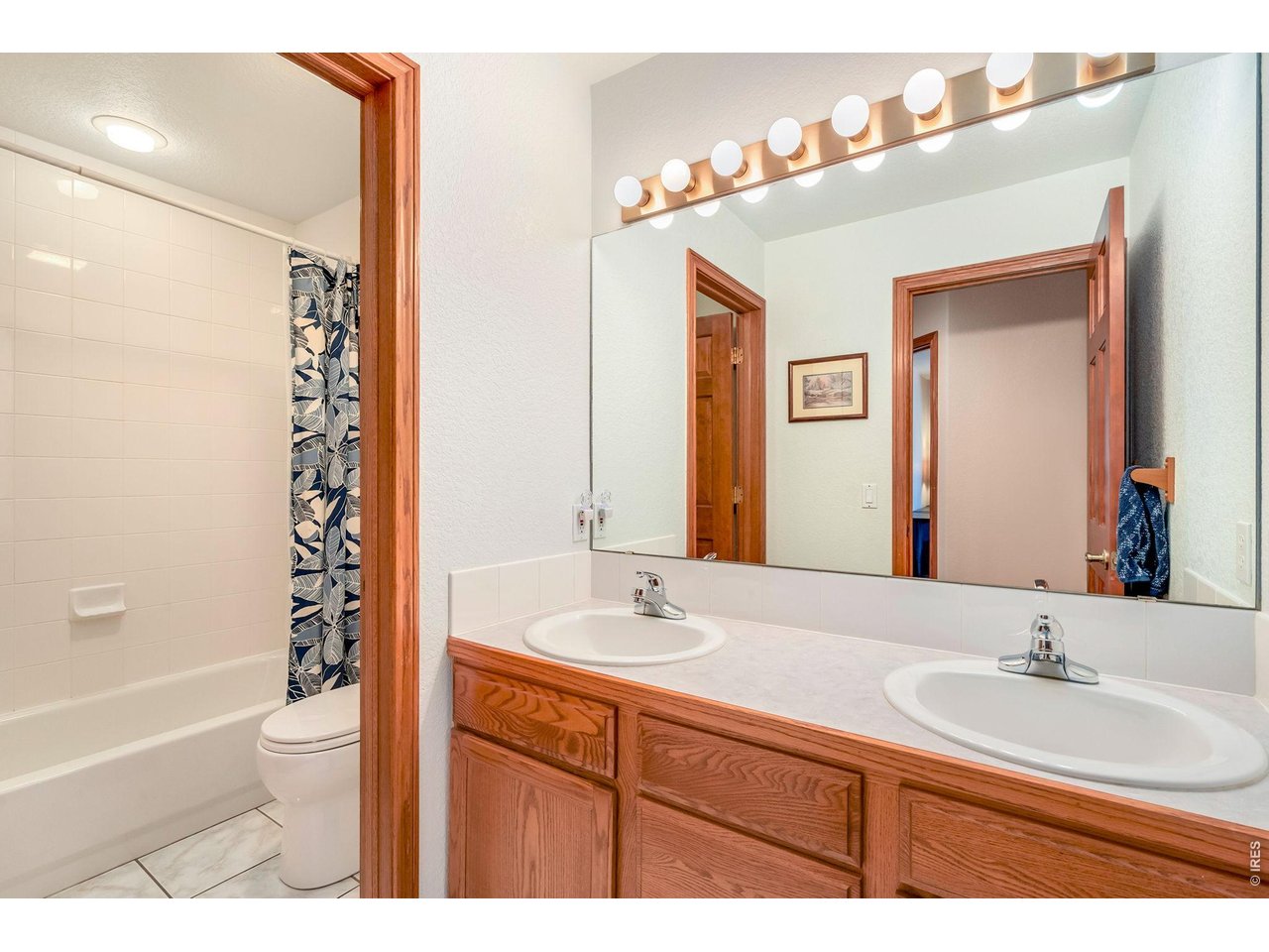 Property Photo 29 Main floor secondary bathroom features separate room for shower and toilet