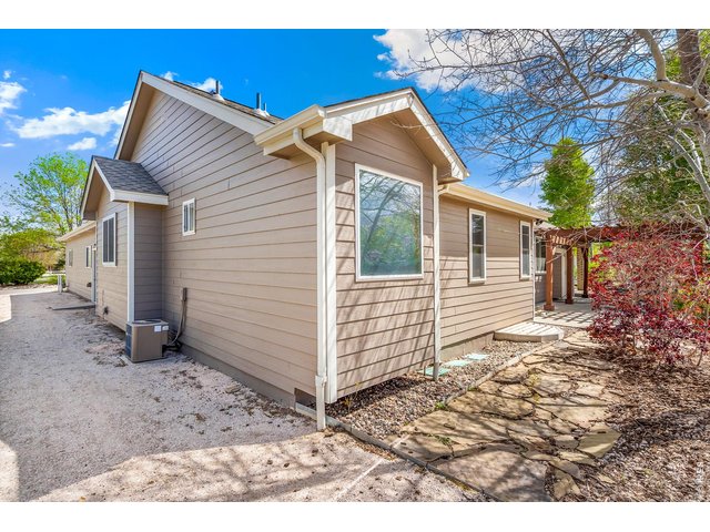 Property Photo 45 North side of house offers extra parking for RV or boat