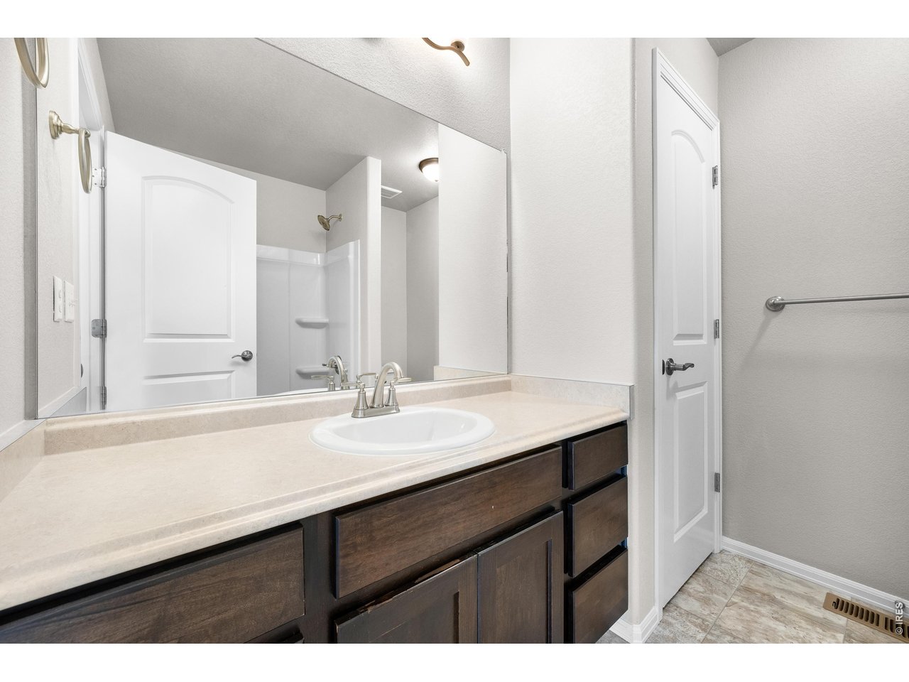 Property Photo 28 main bath area has long coutnertop