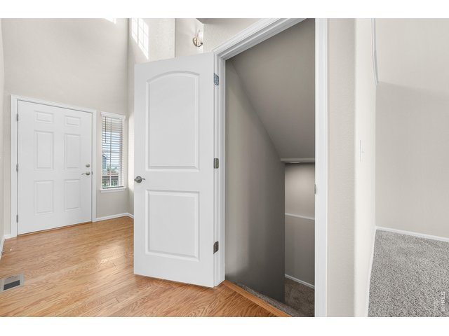 Property Photo 32 entry way down to finished basement