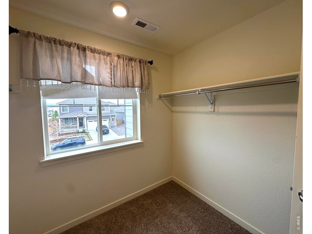 Property Photo 21 Primary Walk-in Closet