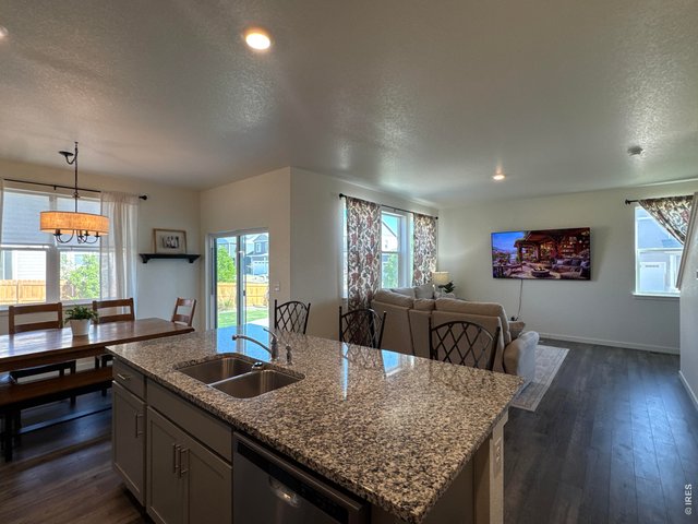 Property Photo 13 Look at all the light. Granite countertops
