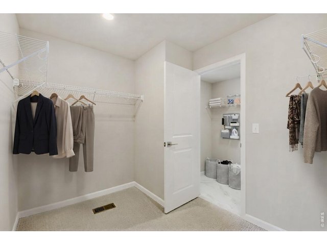 Property Photo 11 Primary Closet