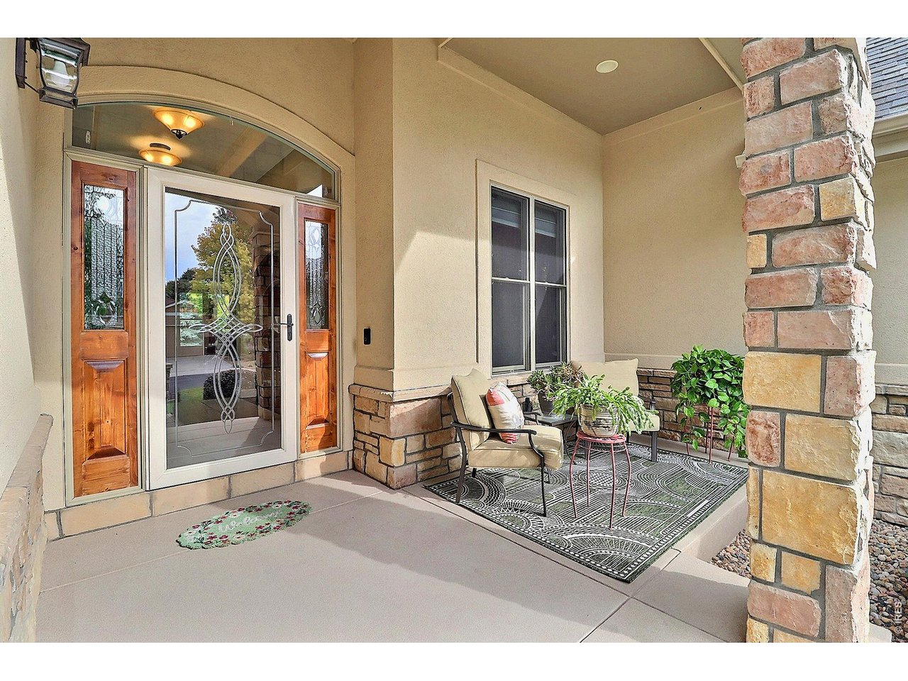 Property Photo 4 Charming Front Entrance Covered Patio