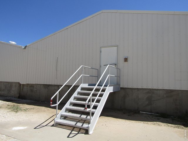 Property Photo 15 Outside Entrance into Large Building