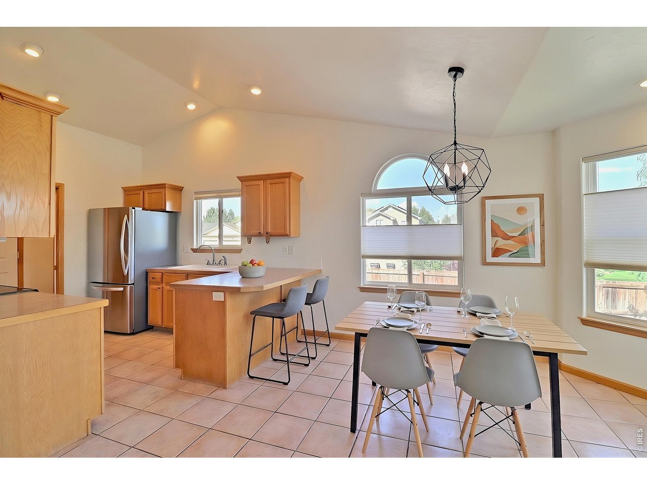 Property Photo 8 Virtually Staged Dining Room and Kitchen