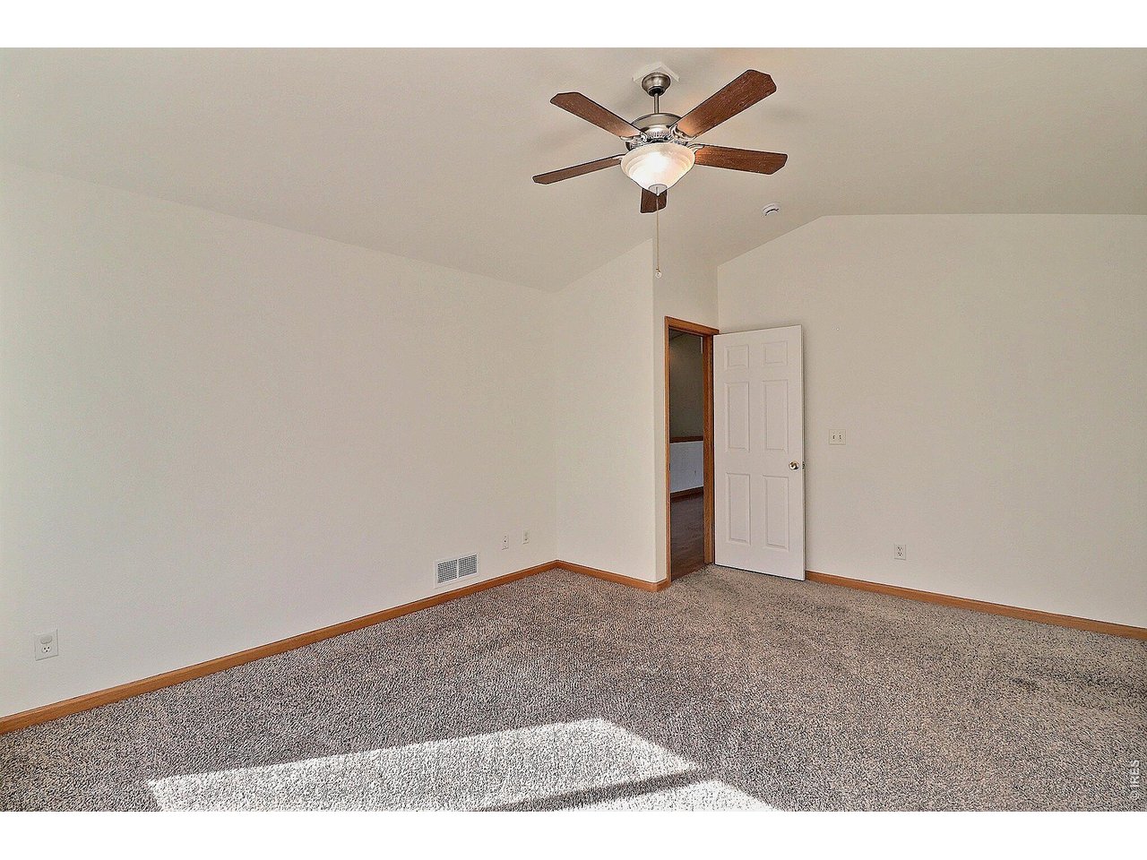 Property Photo 16 Primary Bedroom with Vaulted Ceilings