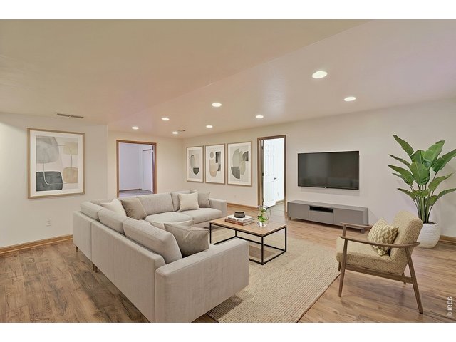 Property Photo 25 Virtually Staged Family Room