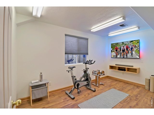 Property Photo 28 Virtually Staged Downstairs Study and or Flex Room