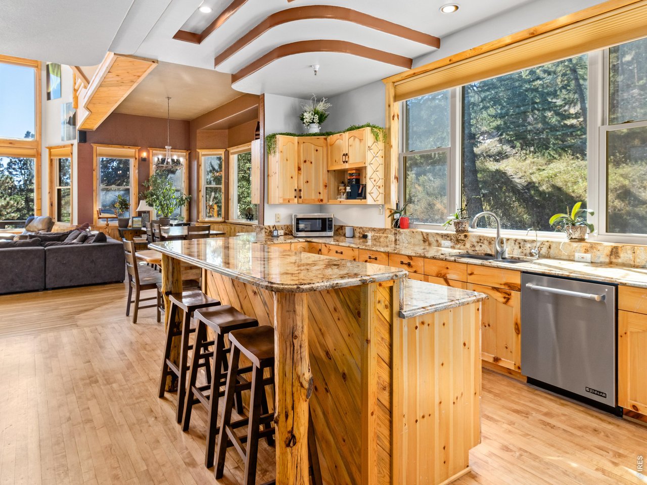 Property Photo 13 Large picture windows provide natural light and views