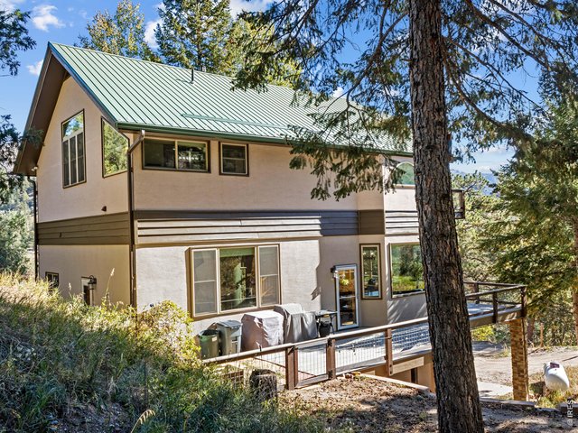Property Photo 39 Deck and backyard are fully enclosed