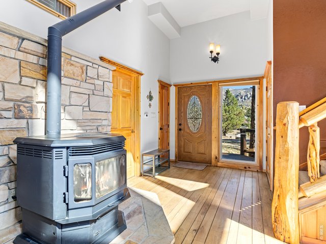 Property Photo 8 Pellet stove and main level entry