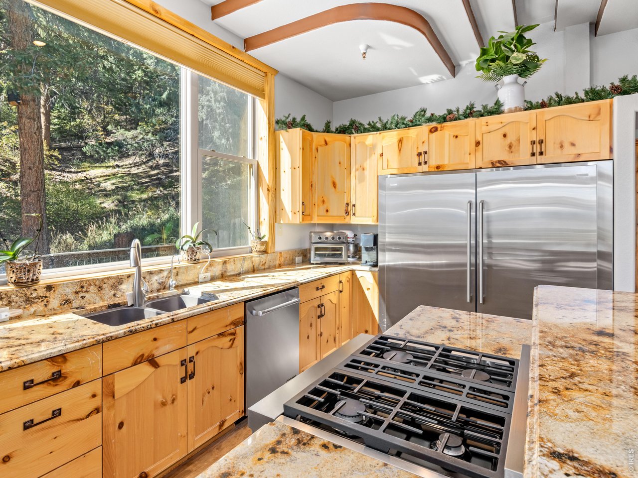 Property Photo 11 Pine cabinets, granite counter and upgraded appliances for your chef's dream
