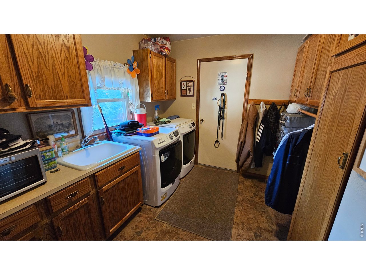 Property Photo 13 Main Laundry room +garage entry