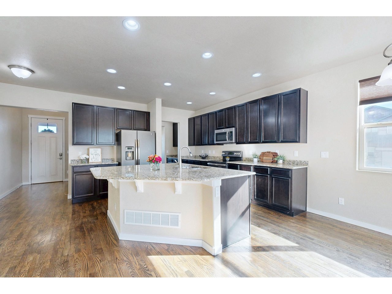 Property Photo 6 Dark wood cabinets, all stainless stell appliances