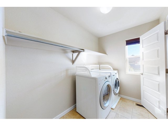 Property Photo 26 Upstairs laundry opens to both the hall and master closet!