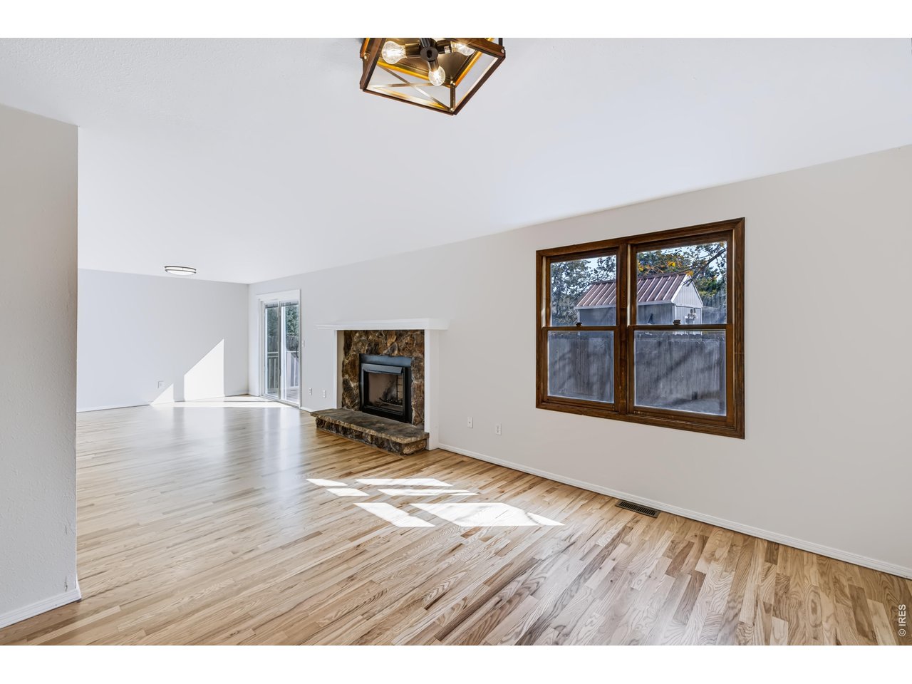 Property Photo 16 Open and bright! Newly refinished Hardwood Floor.