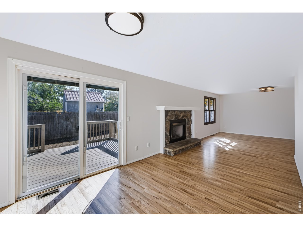 Property Photo 9 Newly refinished Hardwood Floor.