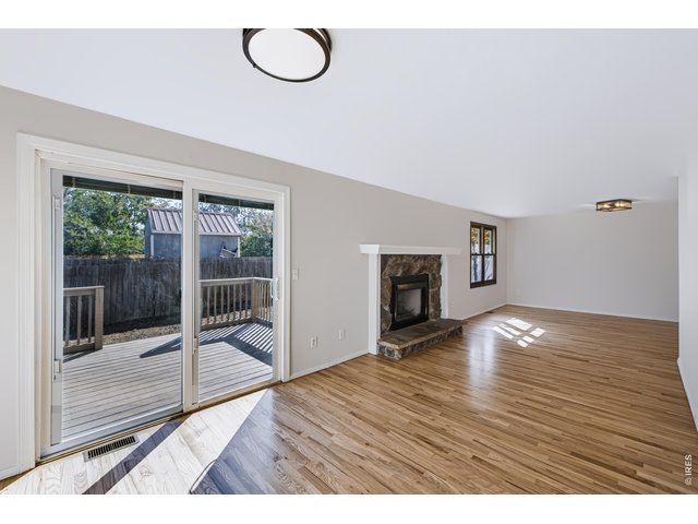 Property Photo 9 Newly refinished Hardwood Floor.