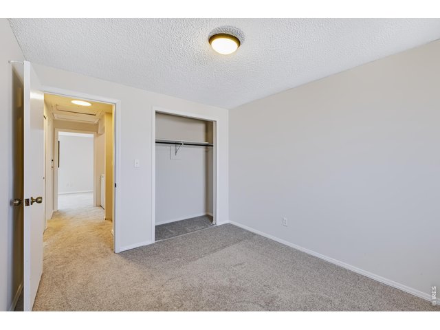 Property Photo 31 Bedroom 3. New carpet and paint.