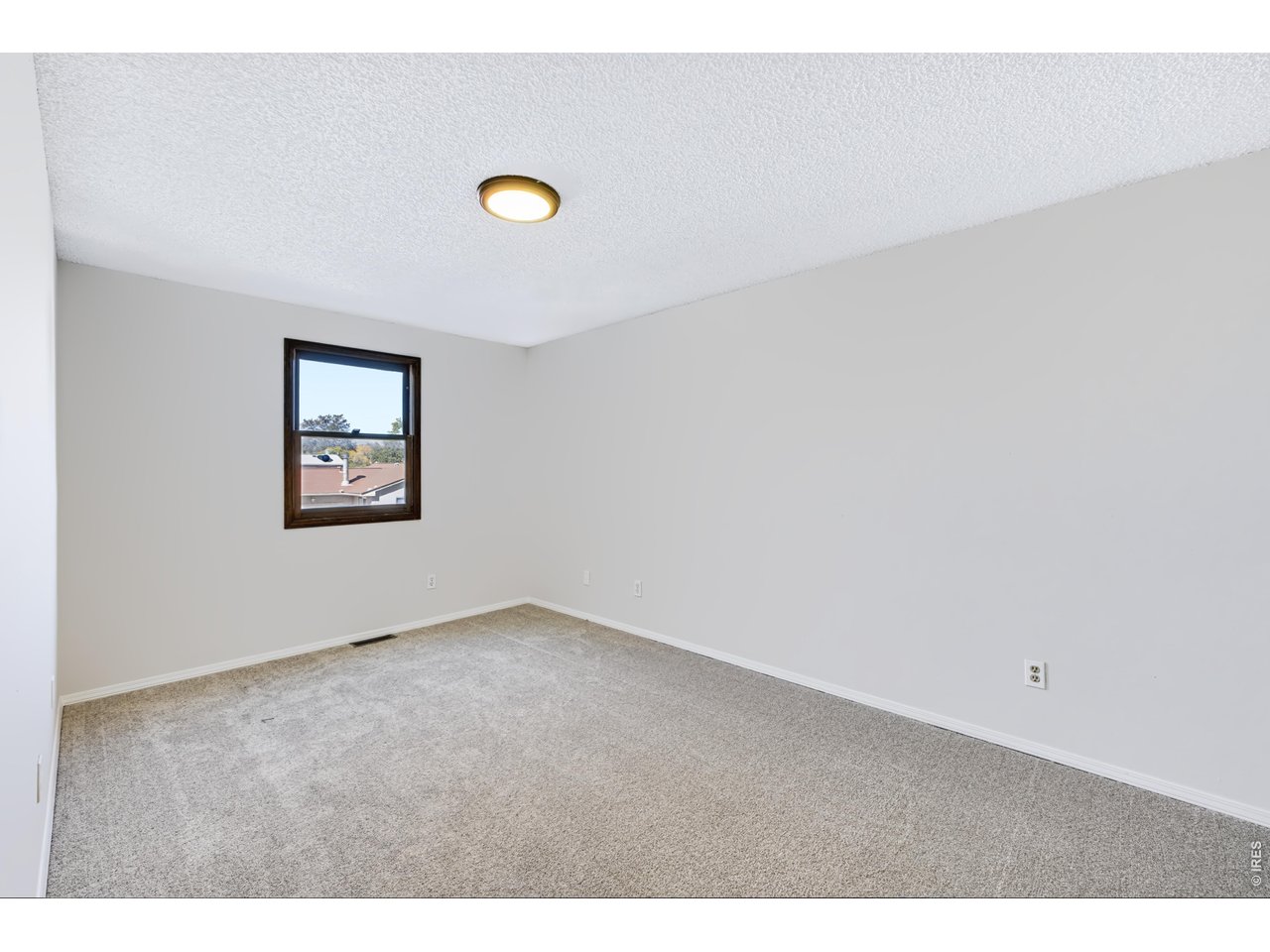 Property Photo 30 Bedroom 3. New carpet and paint. Mountain views!