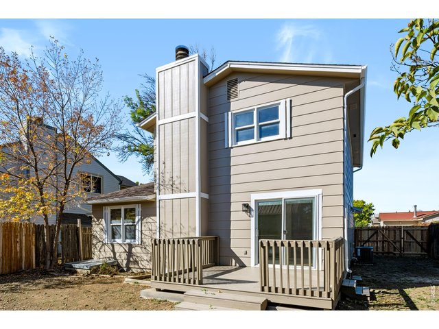 Property Photo 35 New Exterior Paint, Deck and Refreshed Siding