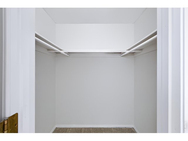 Property Photo 23 Primary Walk-in Closet