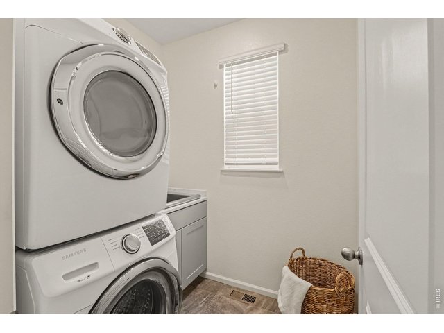 Property Photo 16 Main floor dedicated laundry room with utility sink (W&D included)