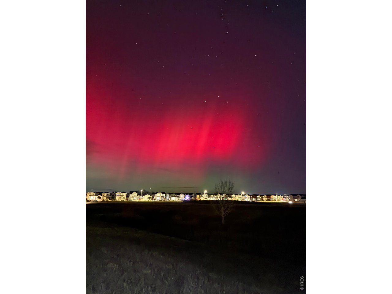 Property Photo 30 Northern Lights off of the Front porch earlier this year (2026)