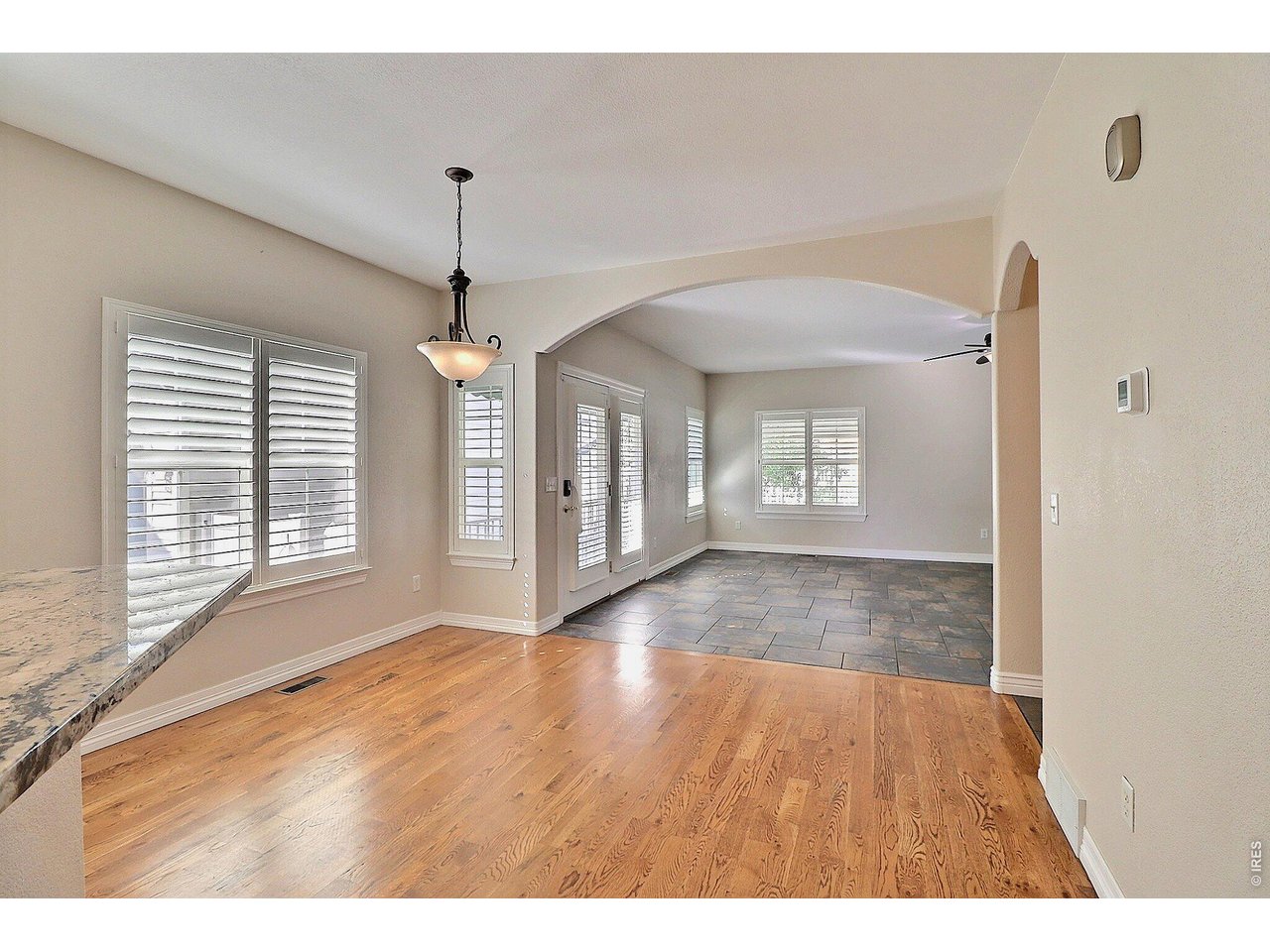 Property Photo 17 Large Archway Opening Leads You Into the Main Floor Great Room