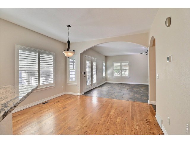 Property Photo 17 Large Archway Opening Leads You Into the Main Floor Great Room