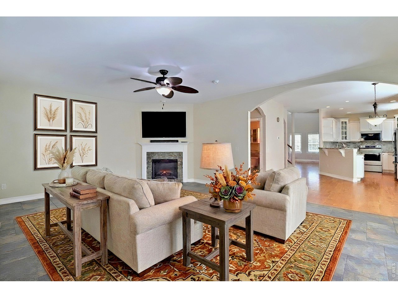 Property Photo 18 Great Room with Fireplace-Virtually Staged