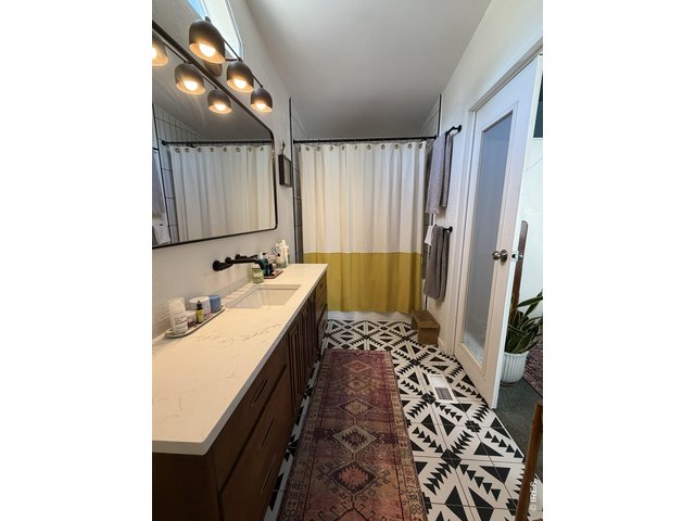Property Photo 9 Custom primary bathroom