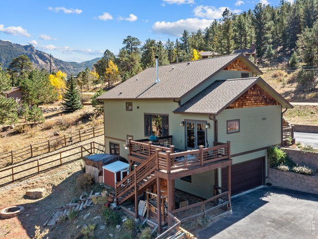 Property Photo 35 Backyard has a chicken coop, fire pit and garden area with raised beds