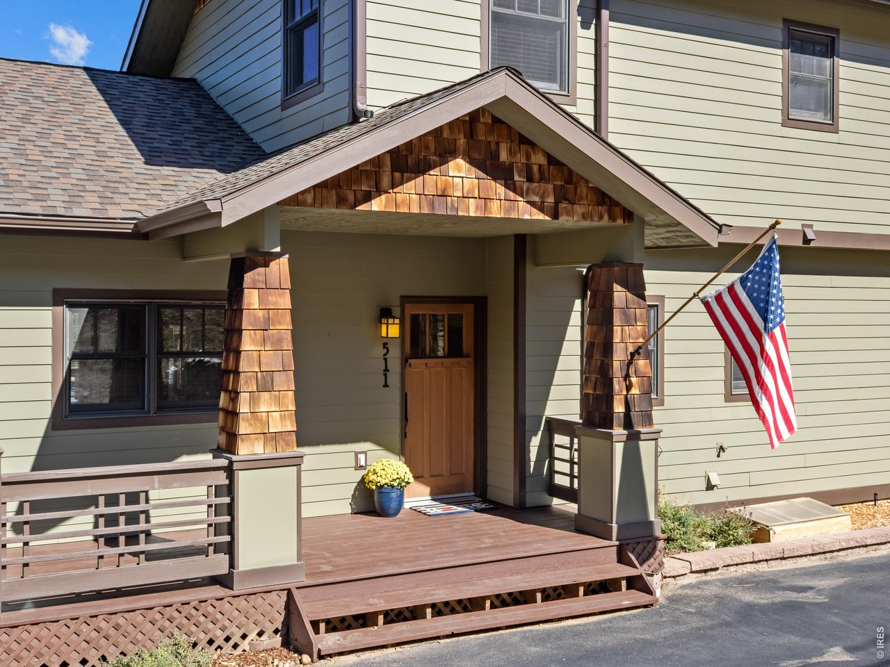Property Photo 3 Covered front porch is a warm welcome