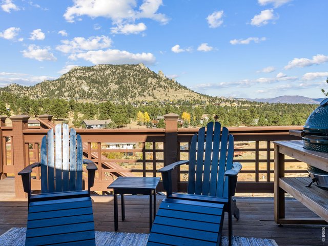 Property Photo 10 Balcony off the dining area is ready for you to enjoy the views and mountain air!