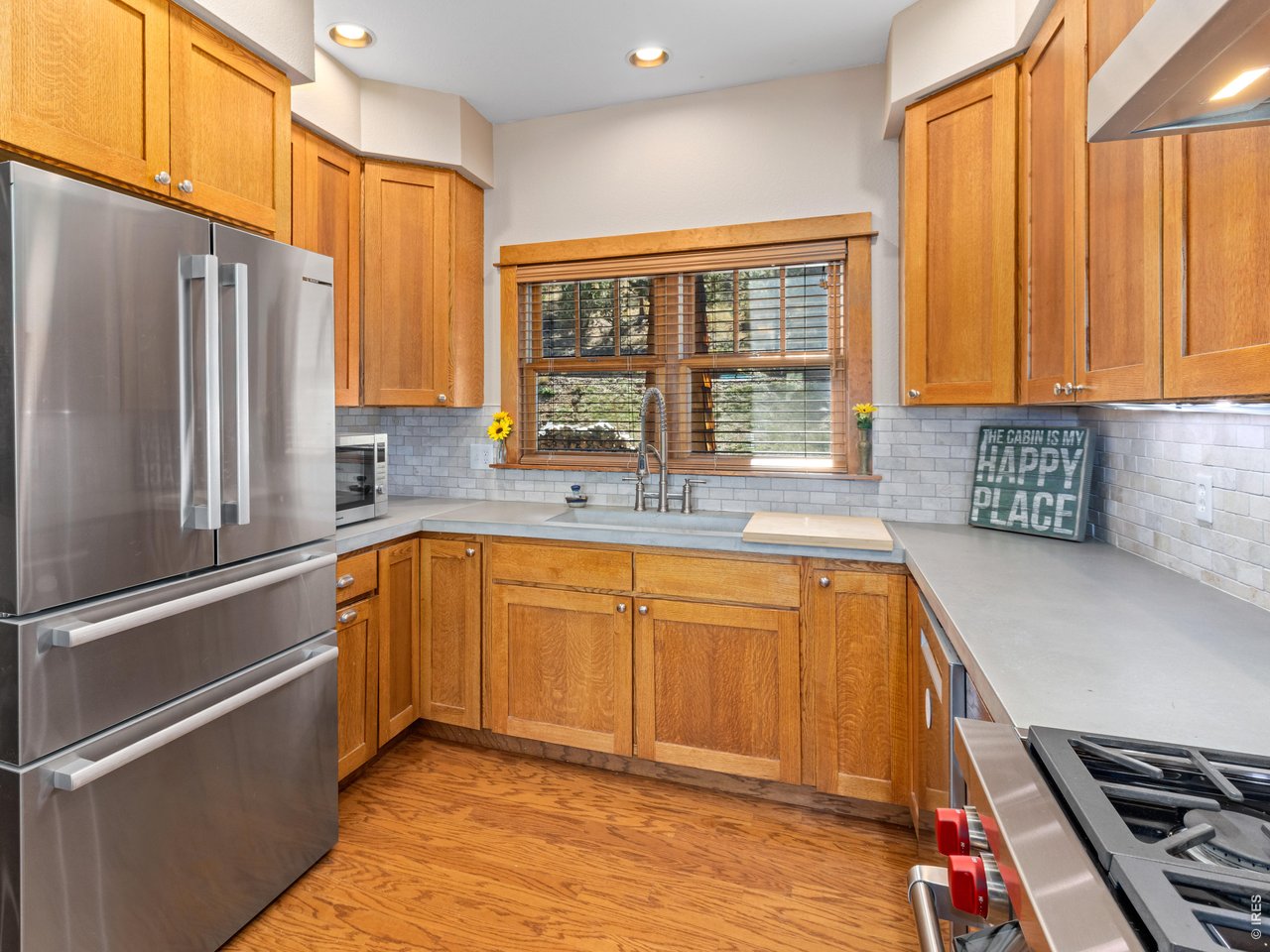 Property Photo 5 functional kitchen with stainless steel appliances and Wolf range